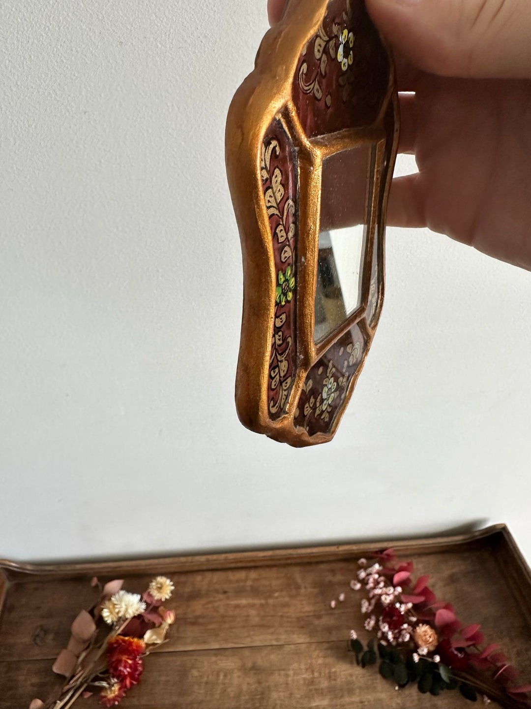 Miroir péruvien émaillé or et marron glacé