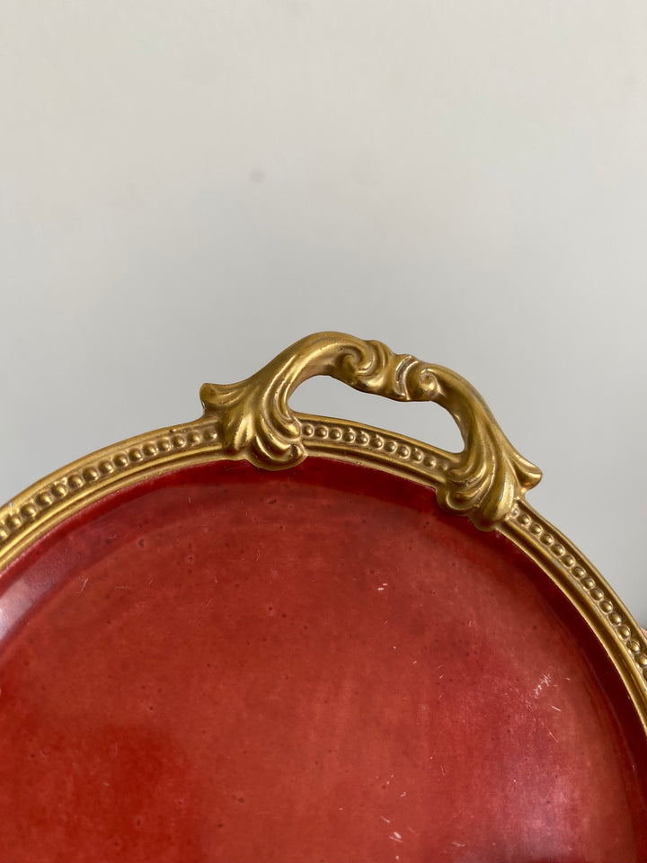 Coupelle en porcelaine rouge anse dorée
