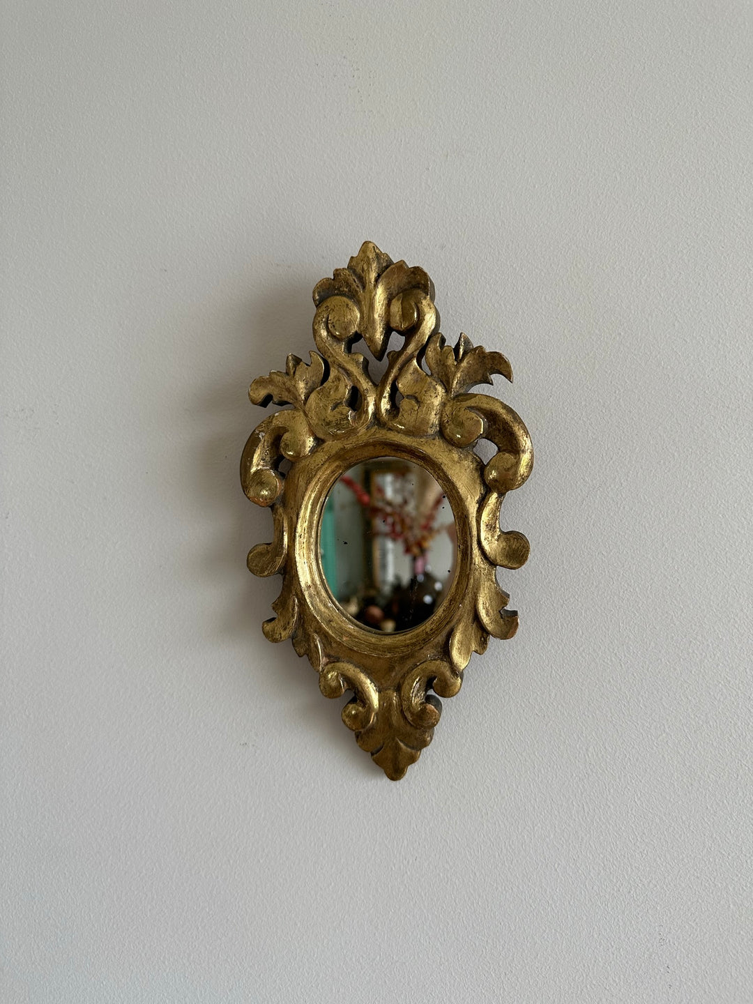 Miroir rococo en bois doré à la feuille d’or taille S