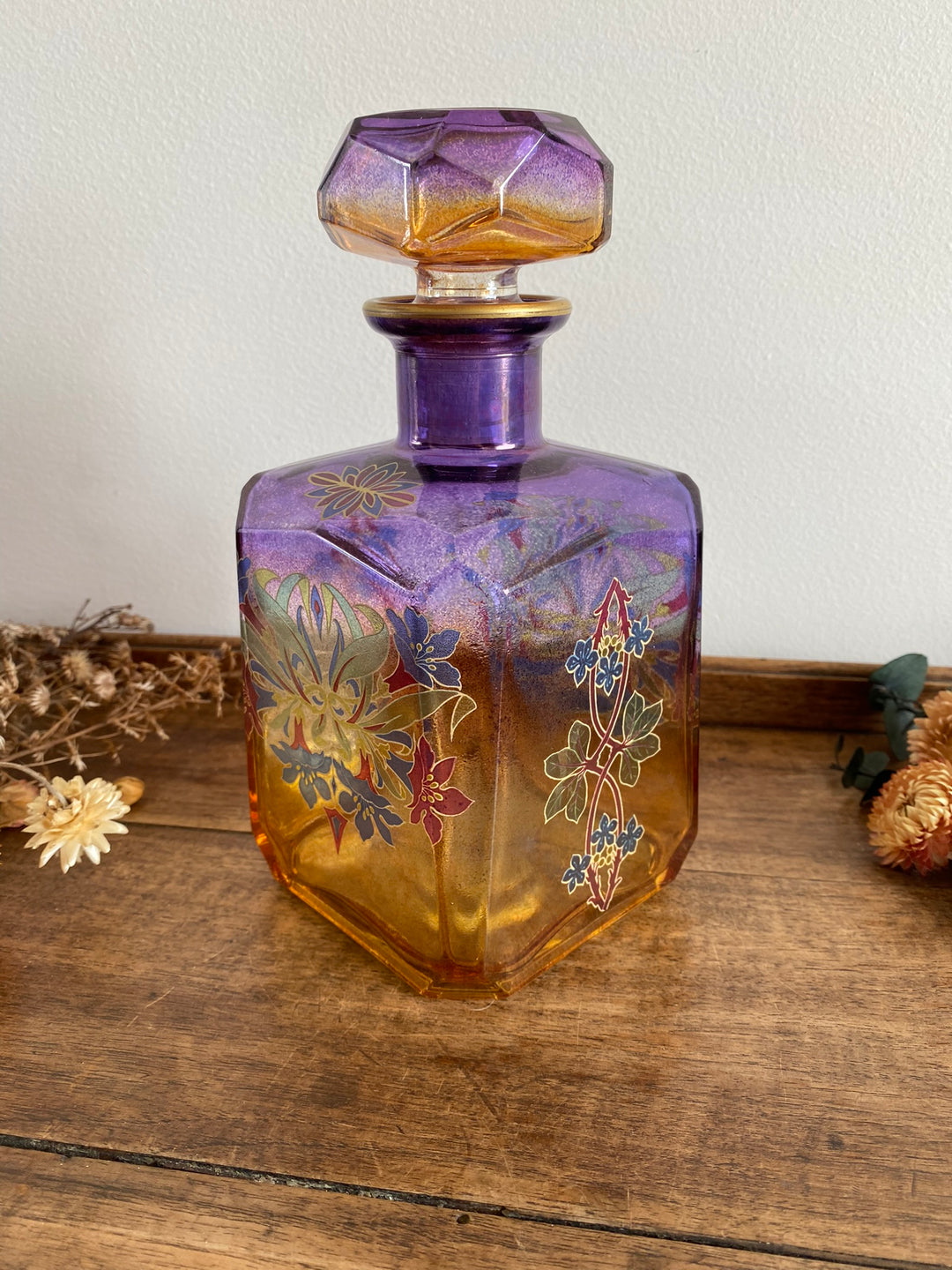 Bouteille dorée et mauve en verre décoration florale