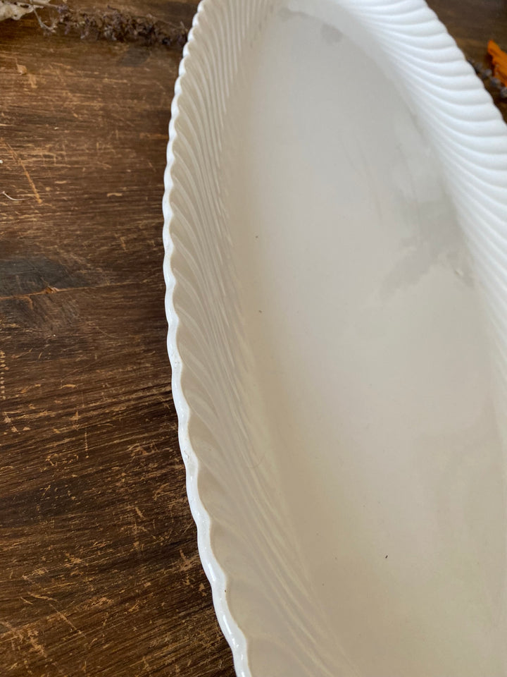 Plat de service en faience Luneveille
