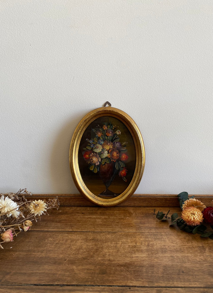 Peinture bouquet de fleurs sous verre cadre doré ovale en bois