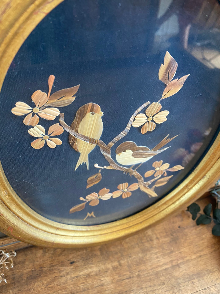 Cadre en bois doré avec motifs oiseaux