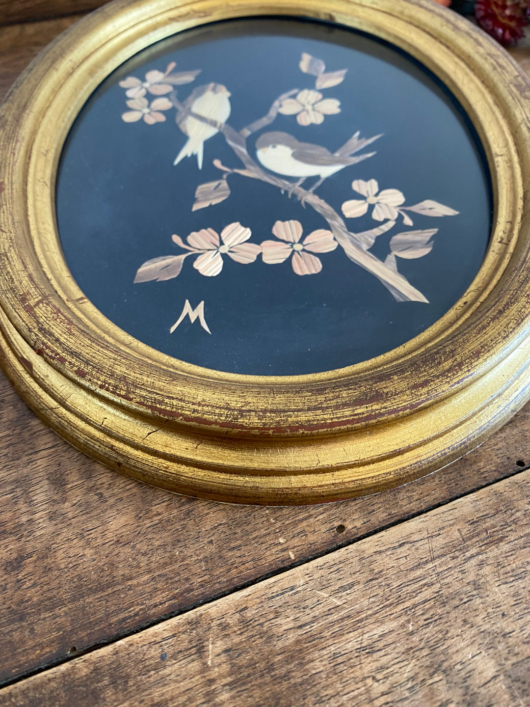 Cadre en bois doré avec motifs oiseaux