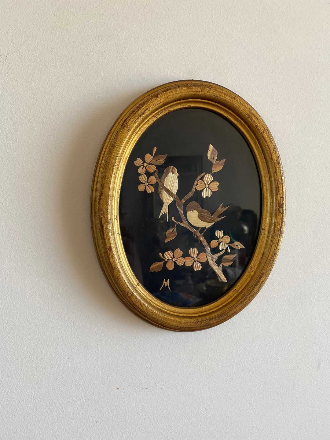 Cadre en bois doré avec motifs oiseaux