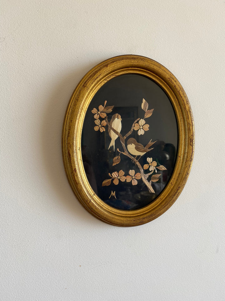 Cadre en bois doré avec motifs oiseaux