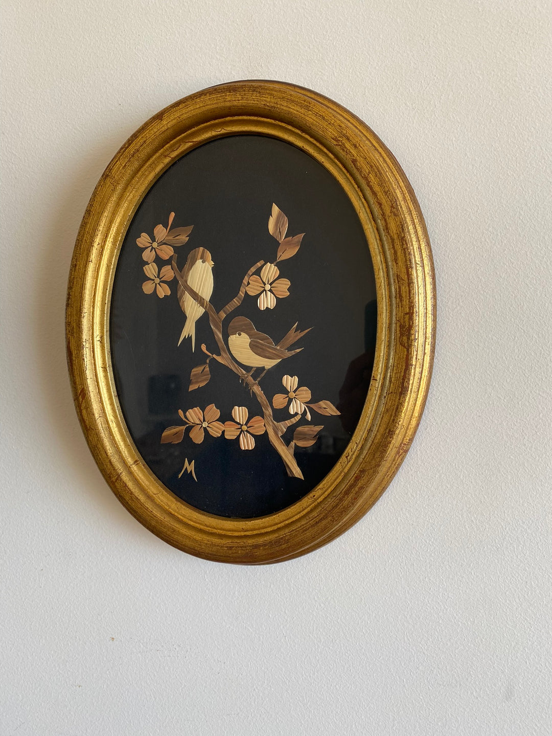 Cadre en bois doré avec motifs oiseaux