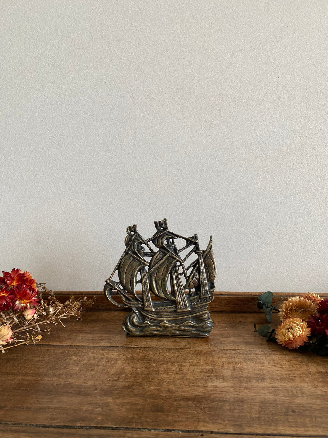 Presse livre Bateau en laiton début XXème
