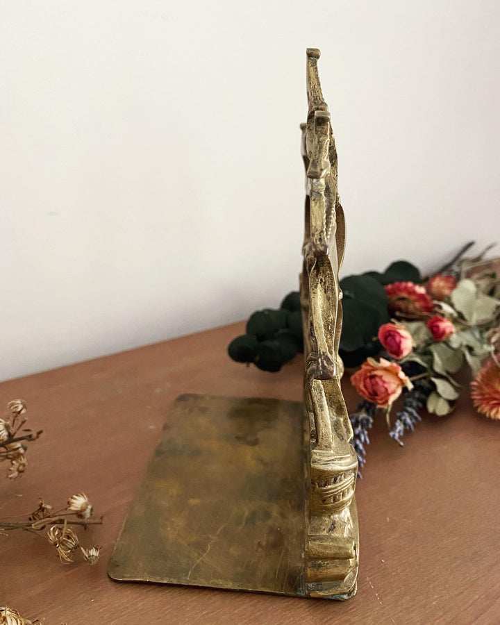 Serre-livre bateau vintage en laiton