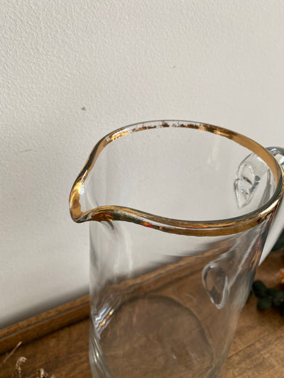 Cruche en verre transparent bordure dorée