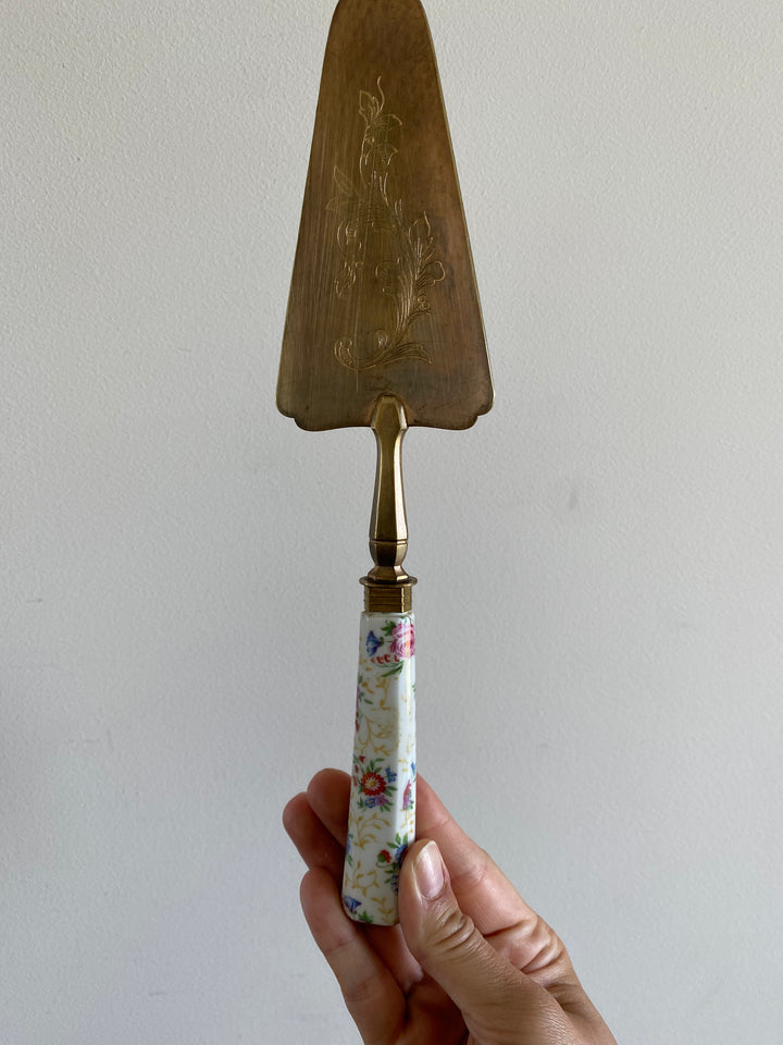 Pelle à tarte manche porcelaine