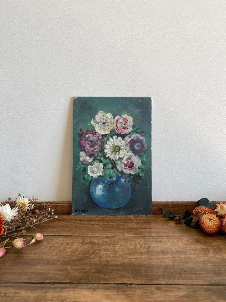 Peinture sur carton nature morte sur fond bleu