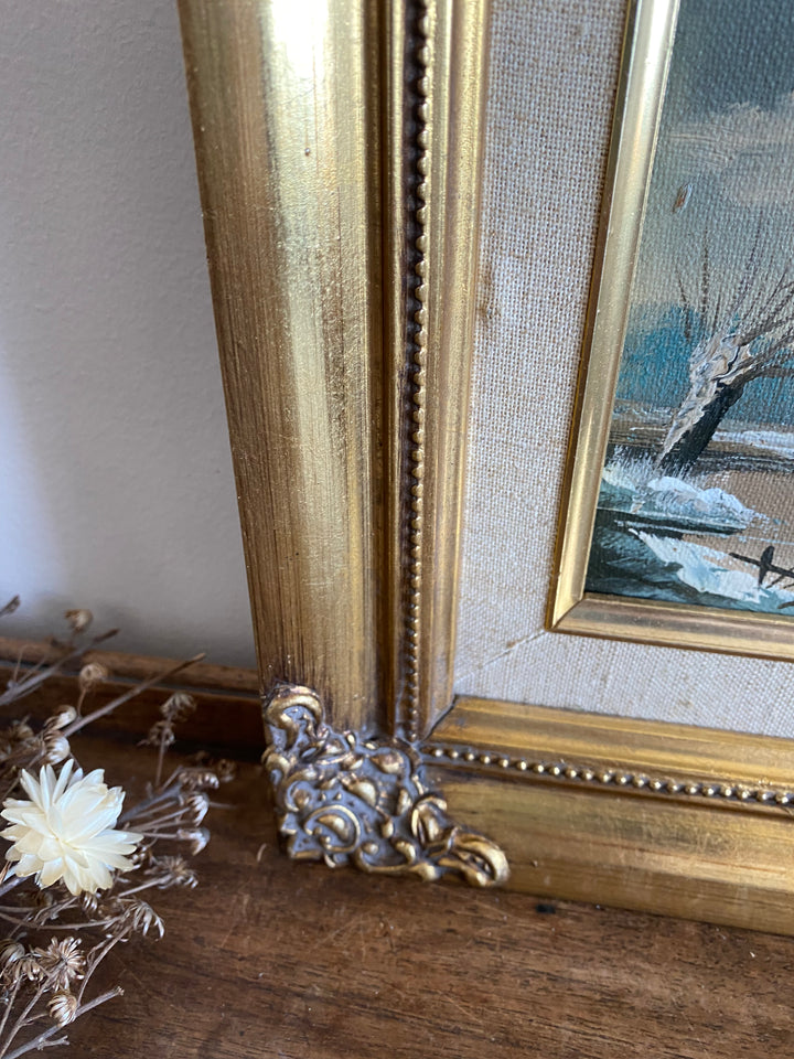 Peinture au cadre doré