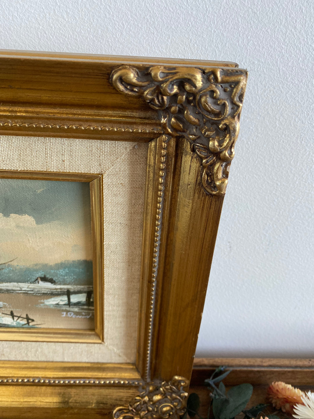 Peinture au cadre doré