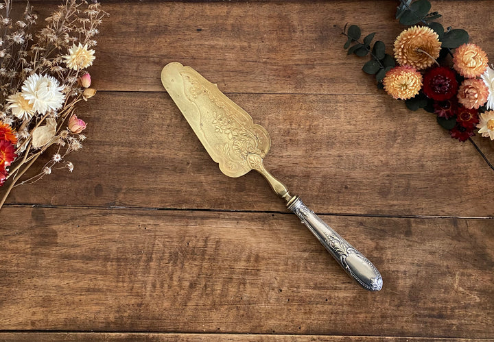 Pelle à tarte en métal argenté et doré détails travaillés
