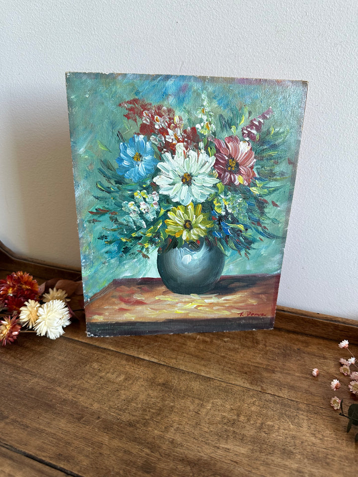 Peinture bouquet de fleurs sur toile avec fond bleu