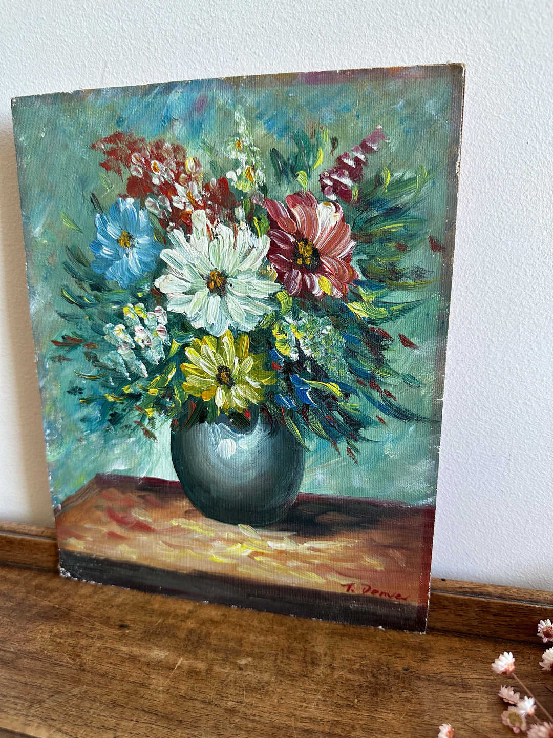 Peinture bouquet de fleurs sur toile avec fond bleu