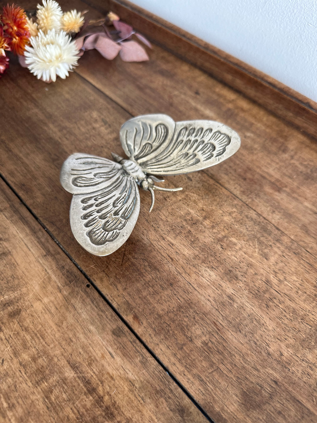 Papillon décoratif en métal argenté