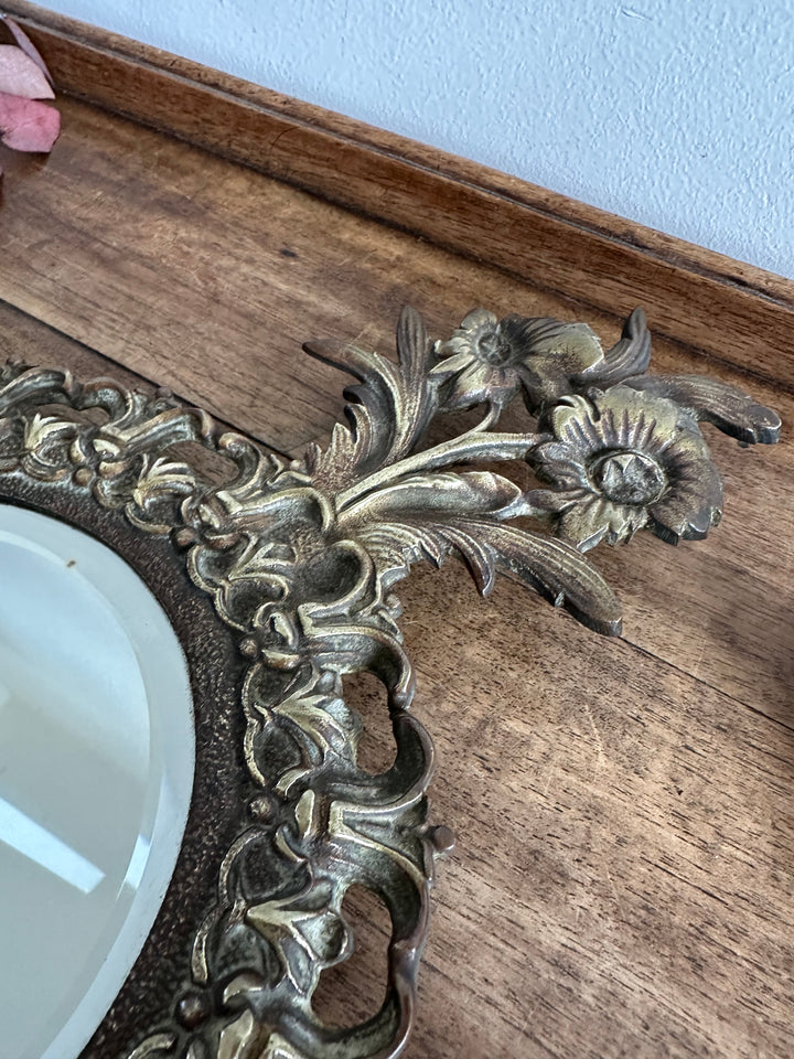 Miroir en bronze 19ème style baroque fronton marguerites