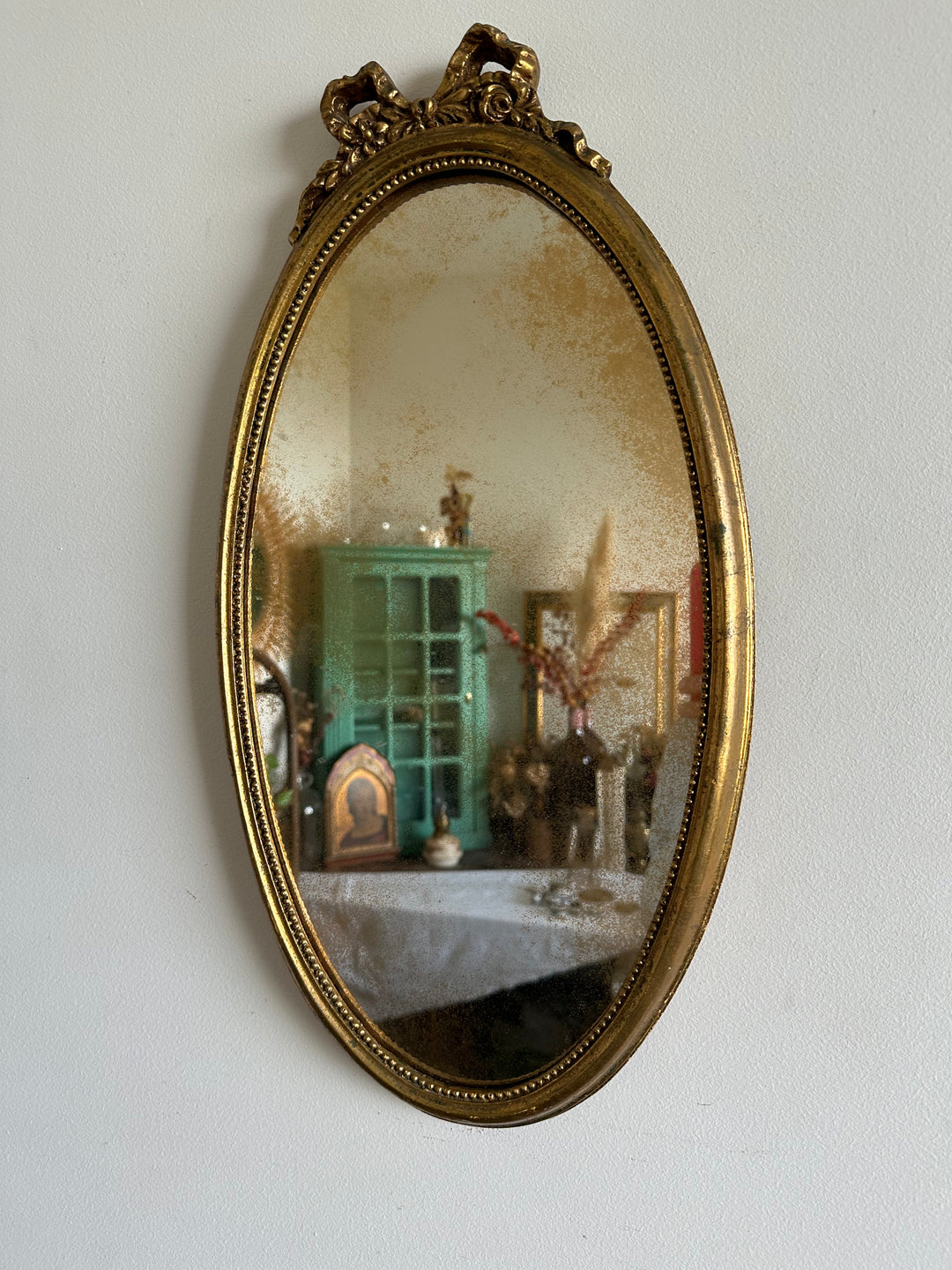 Miroir en bois ovale fronton forme de nœud