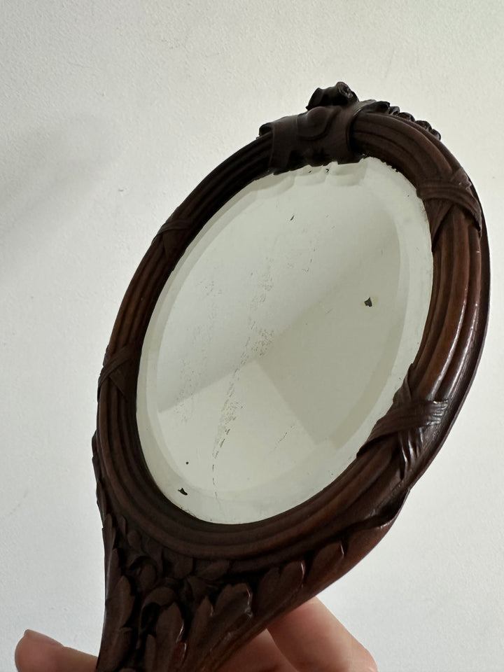 Miroir à main Art nouveau en bois sculpté