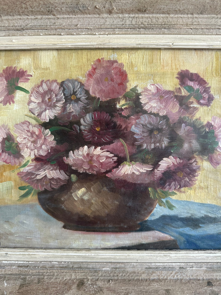 Peinture signée Gruner bouquet de fleurs mauves sur toile