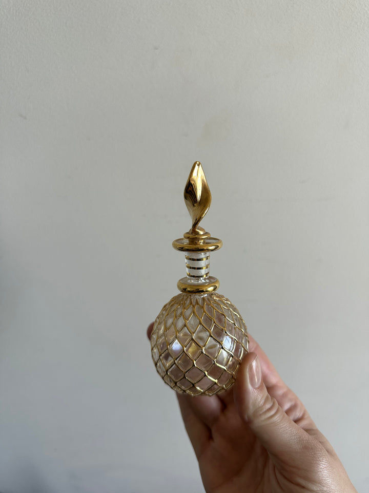 Fioles à parfum vintage dorées rondes