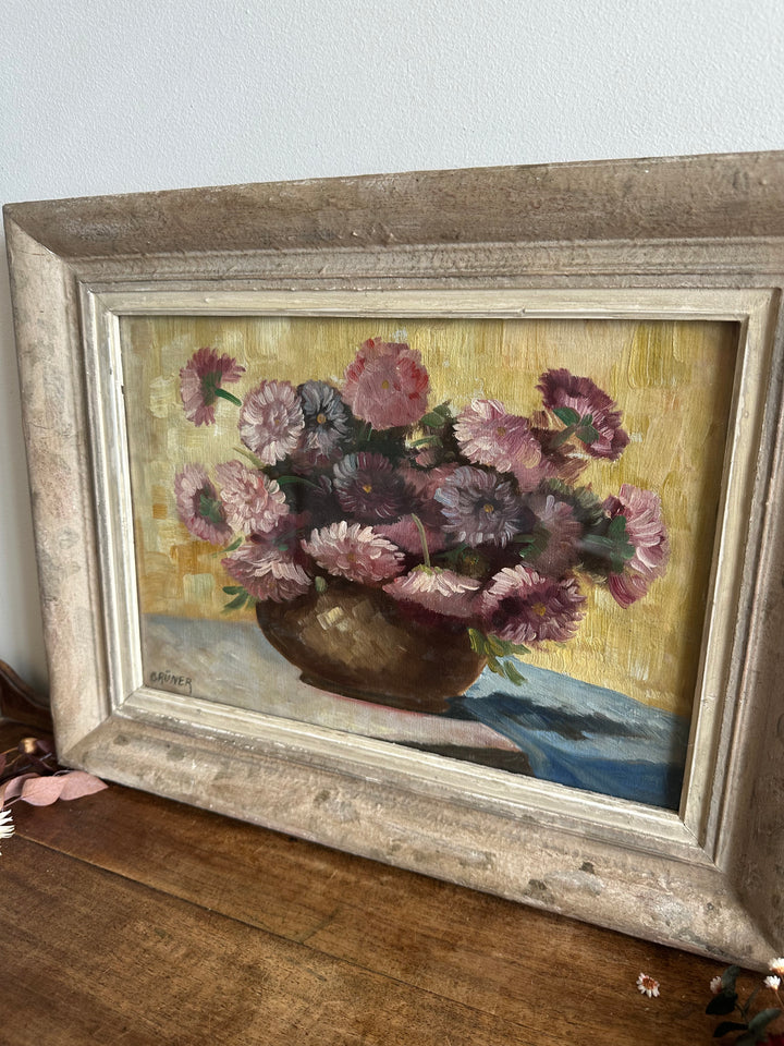 Peinture signée Gruner bouquet de fleurs mauves sur toile