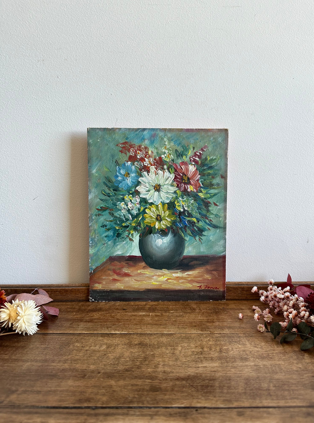 Peinture bouquet de fleurs sur toile avec fond bleu