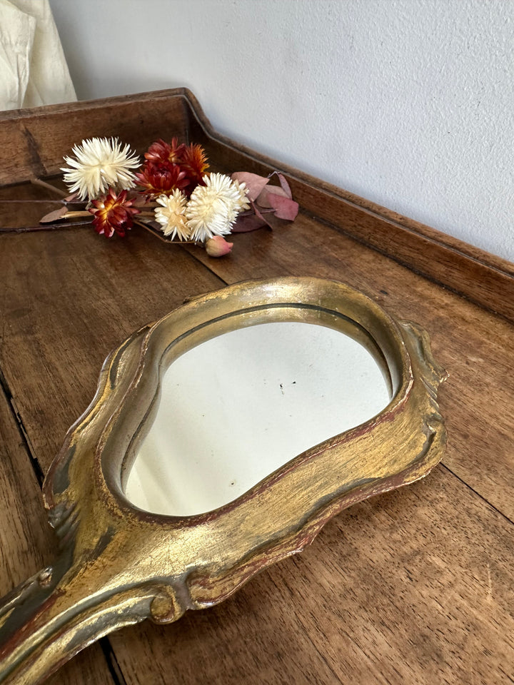 Miroir à main florentin en résine dorée