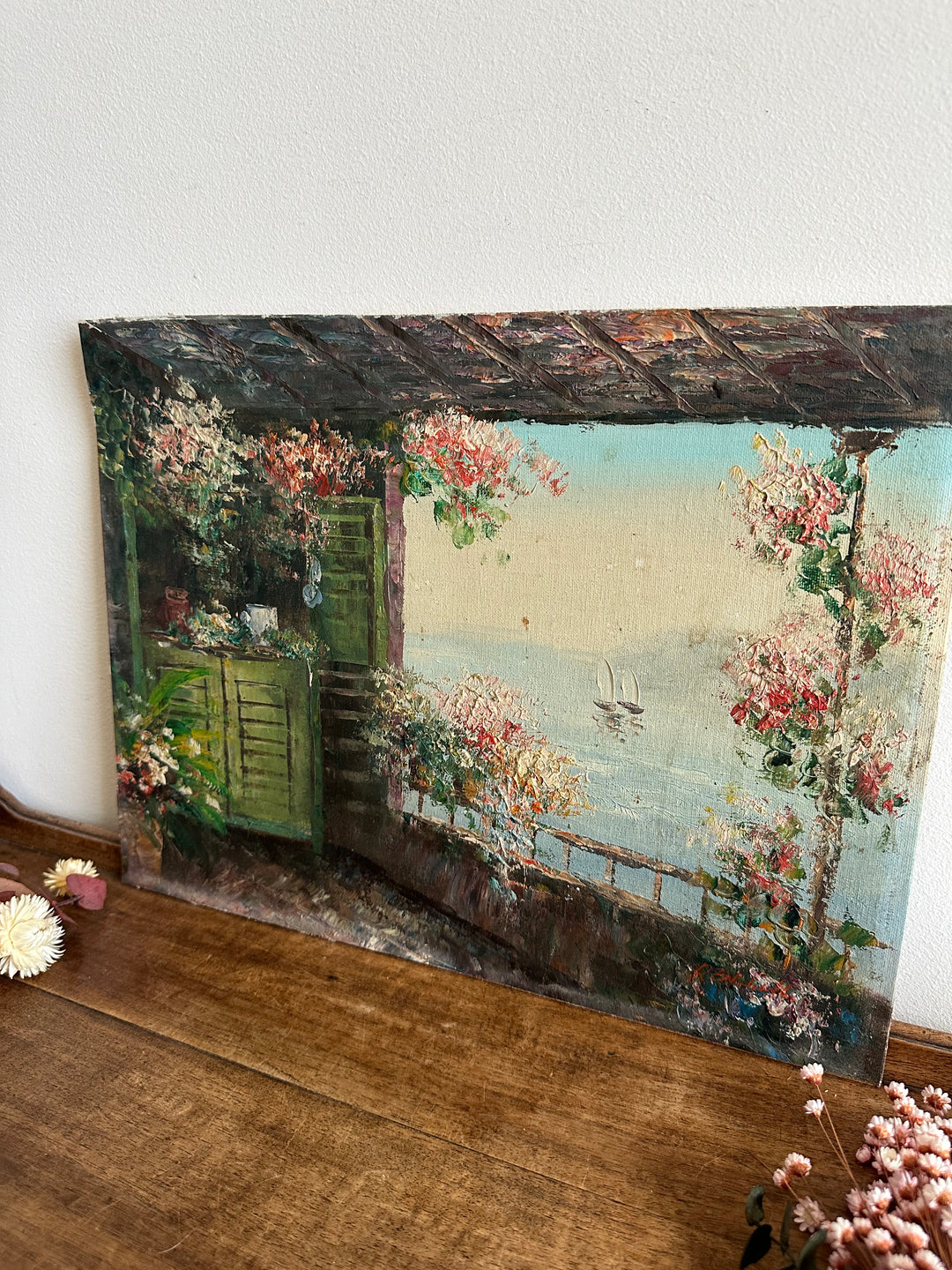 Peinture sur toile terrasse fleurie vue mer