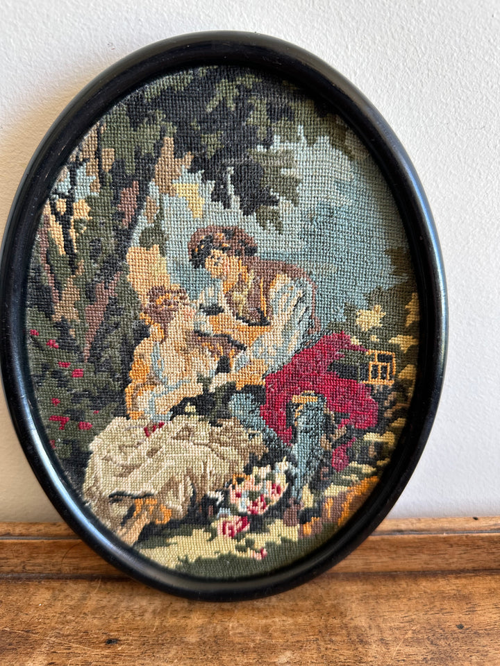 Broderie au point de croix encadrée scène romantique