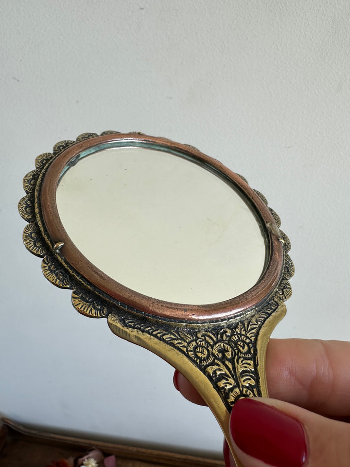 Miroir à main paon en laiton