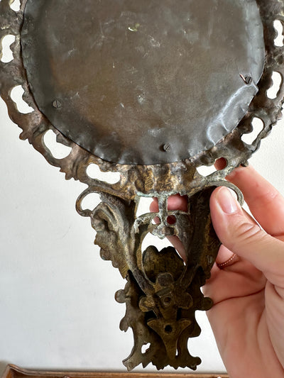 Miroir en bronze 19ème style baroque fronton marguerites