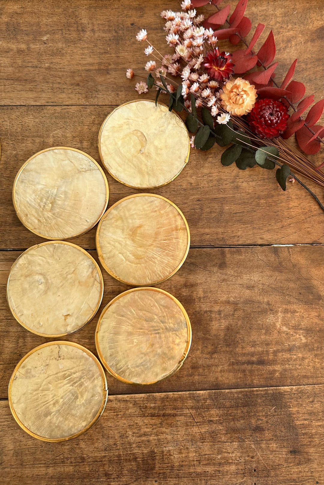 Sous-verres en nacre et liège cerclés de laiton