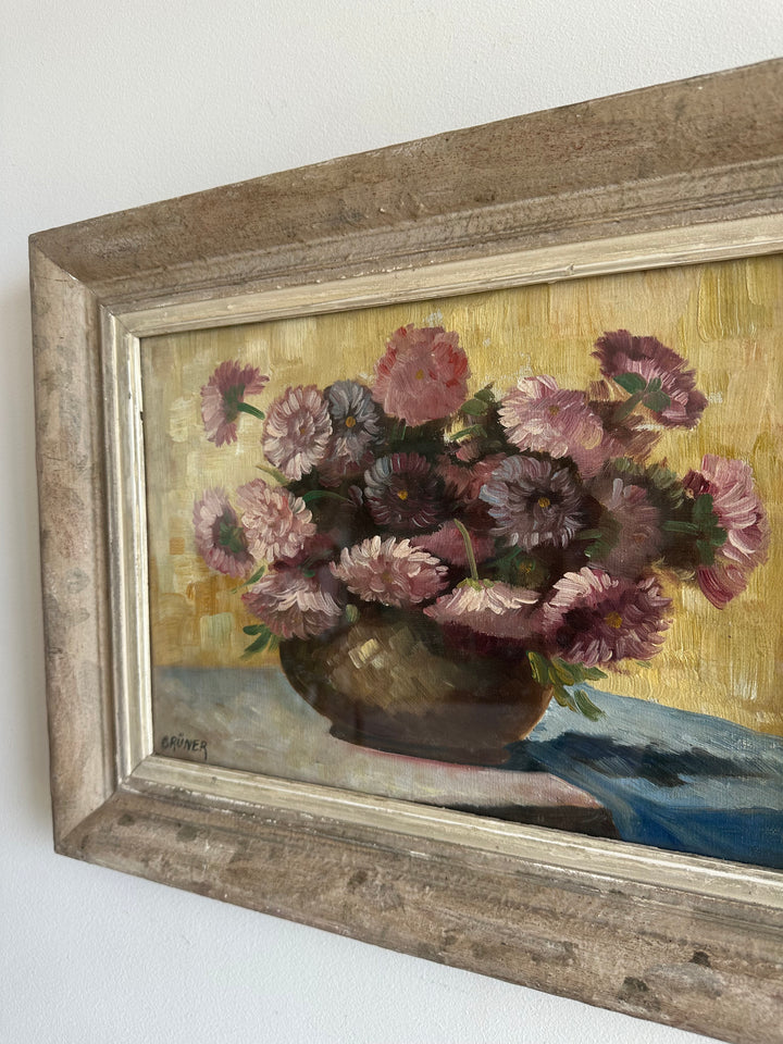 Peinture signée Gruner bouquet de fleurs mauves sur toile