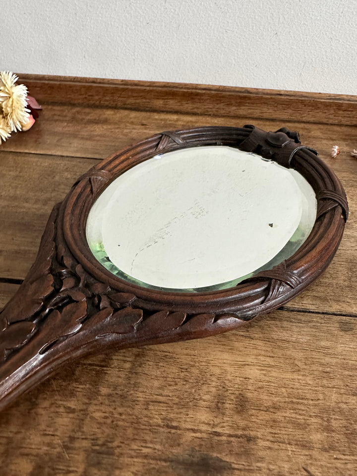 Miroir à main Art nouveau en bois sculpté