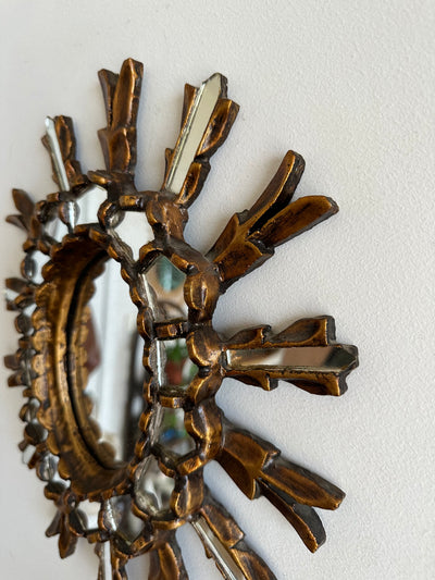 Miroir en bois doré en étoile