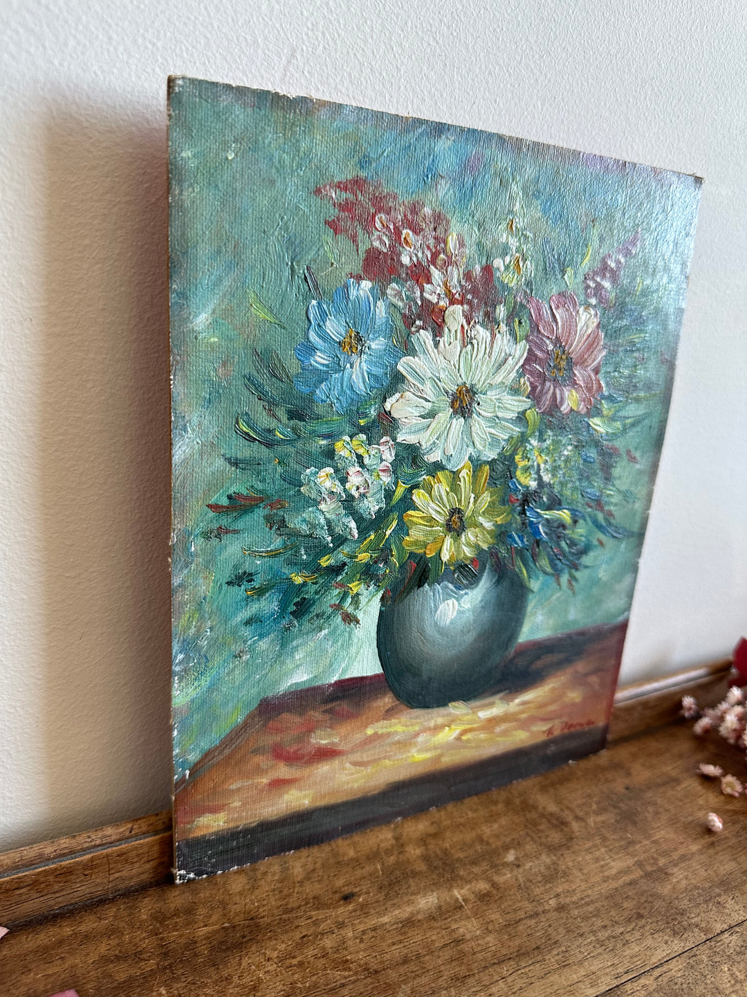 Peinture bouquet de fleurs sur toile avec fond bleu