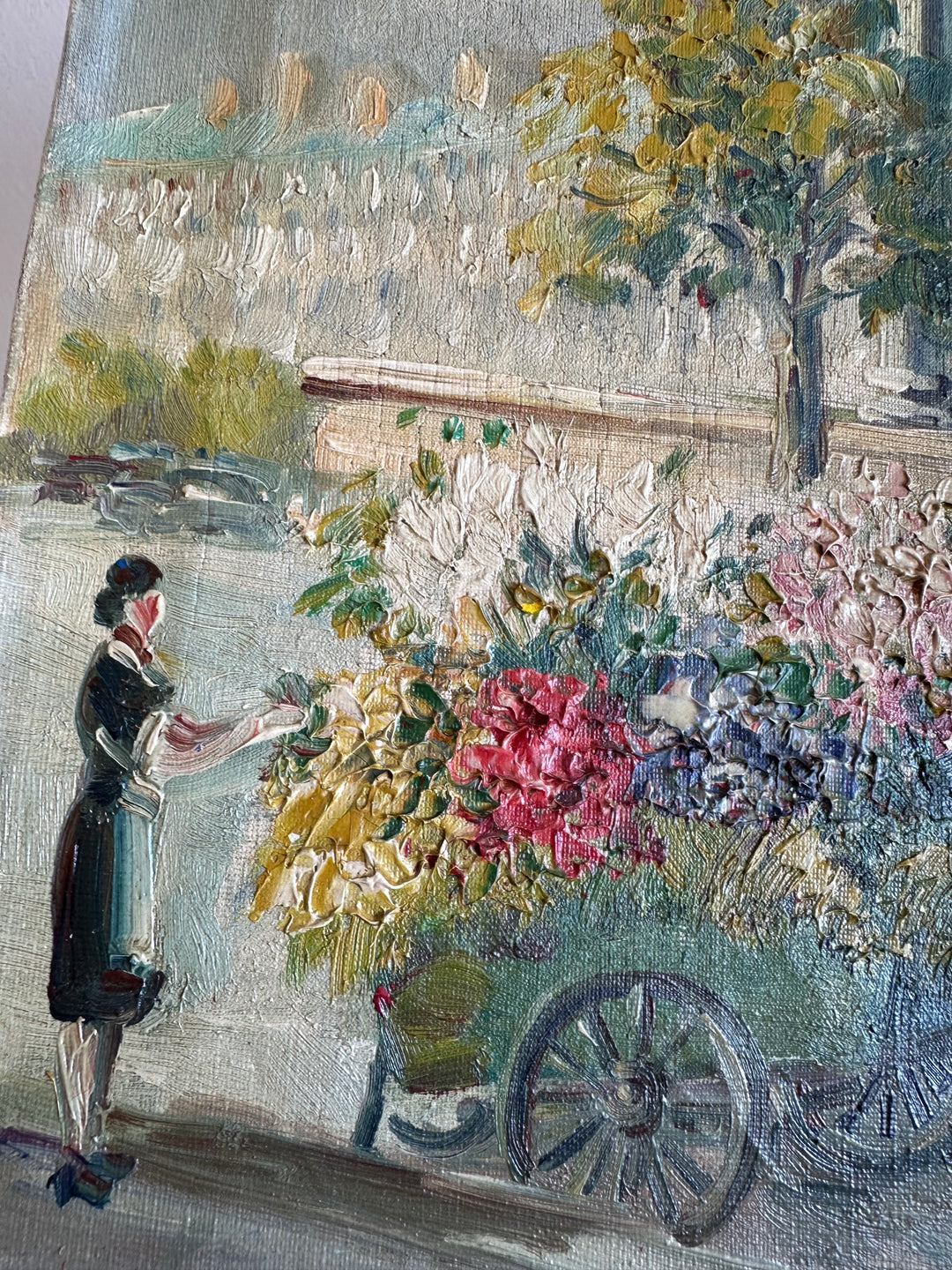 Peinture signée la marchande de fleurs