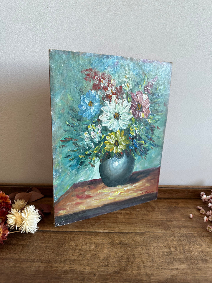 Peinture bouquet de fleurs sur toile avec fond bleu