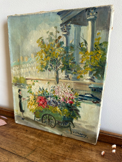 Peinture signée la marchande de fleurs