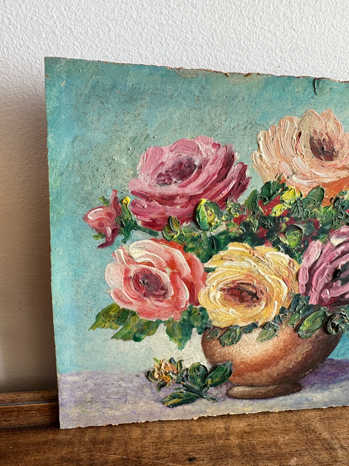 Peinture bouquet de fleur sur fond bleu tons roses orangés jaunes