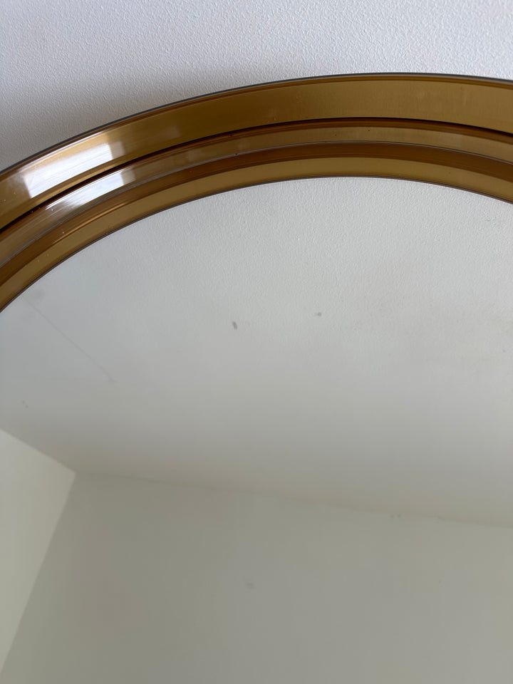 Miroir rond en plastique marron années 60-70