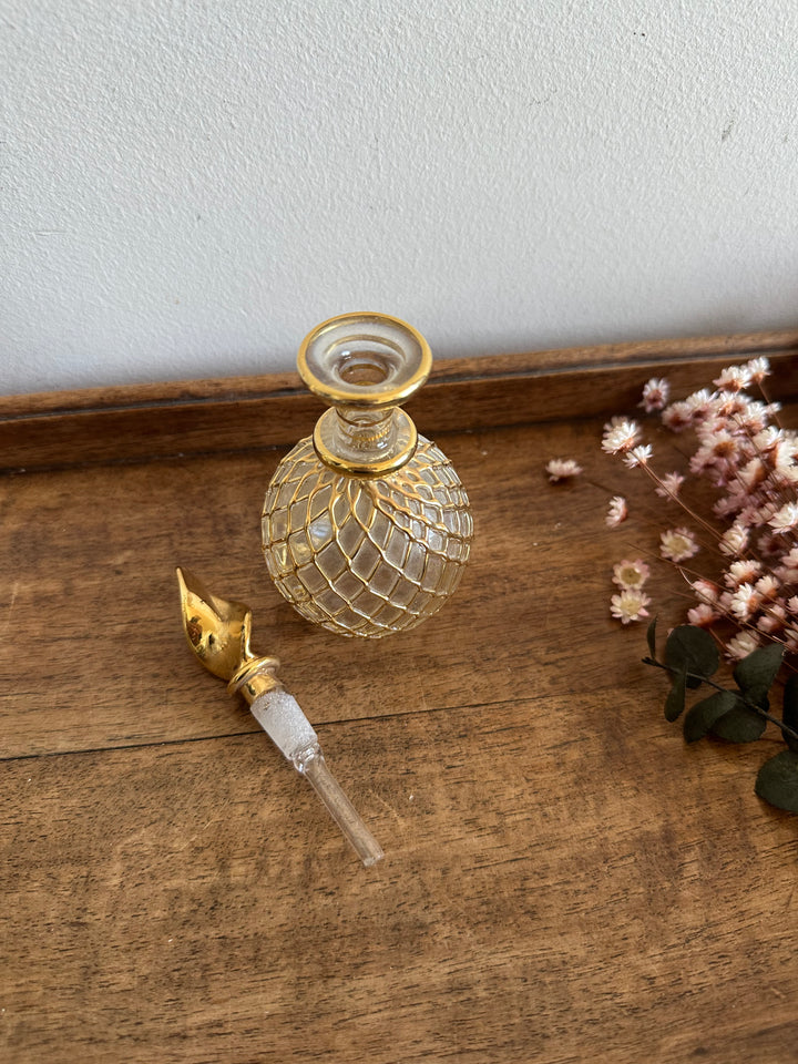 Fioles à parfum vintage dorées rondes