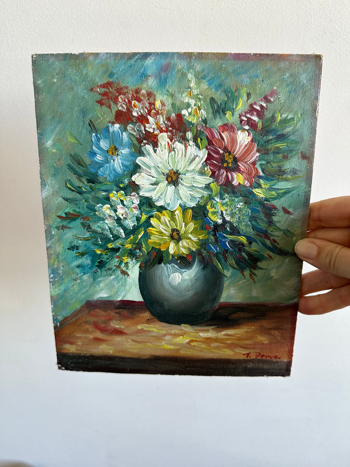 Peinture bouquet de fleurs sur toile avec fond bleu