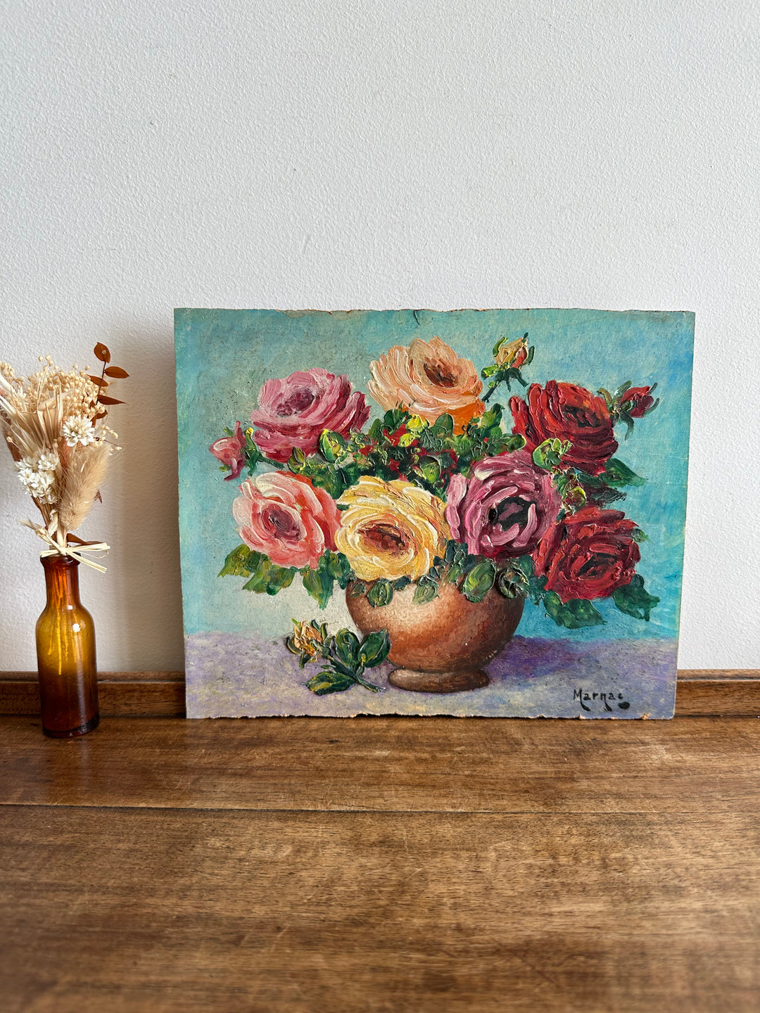 Peinture bouquet de fleur sur fond bleu tons roses orangés jaunes