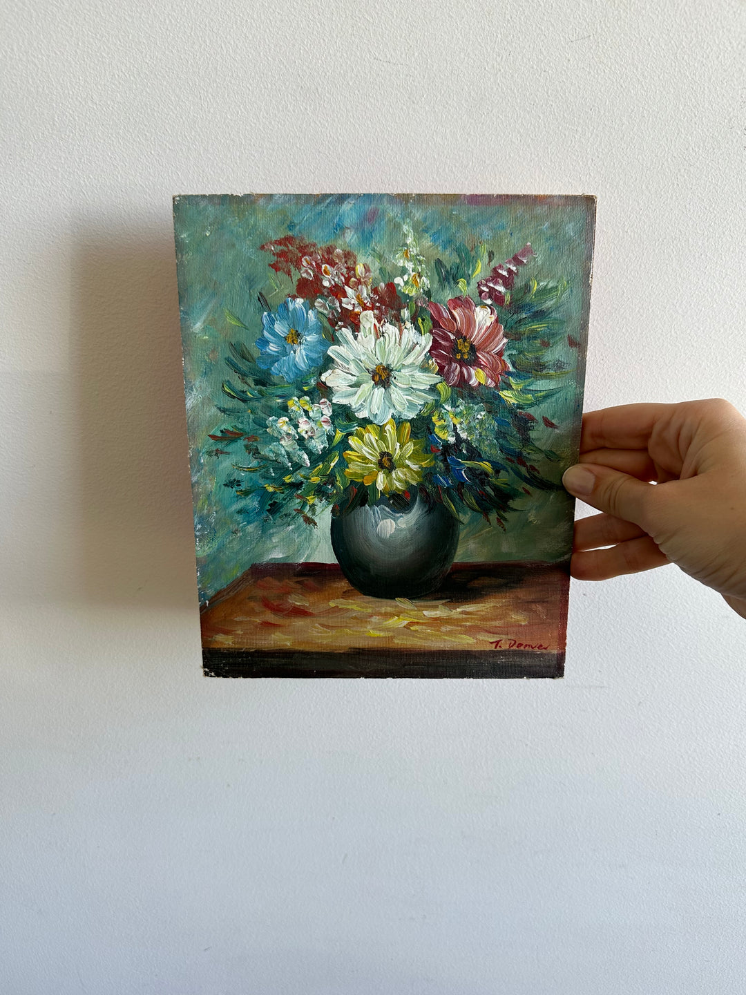 Peinture bouquet de fleurs sur toile avec fond bleu