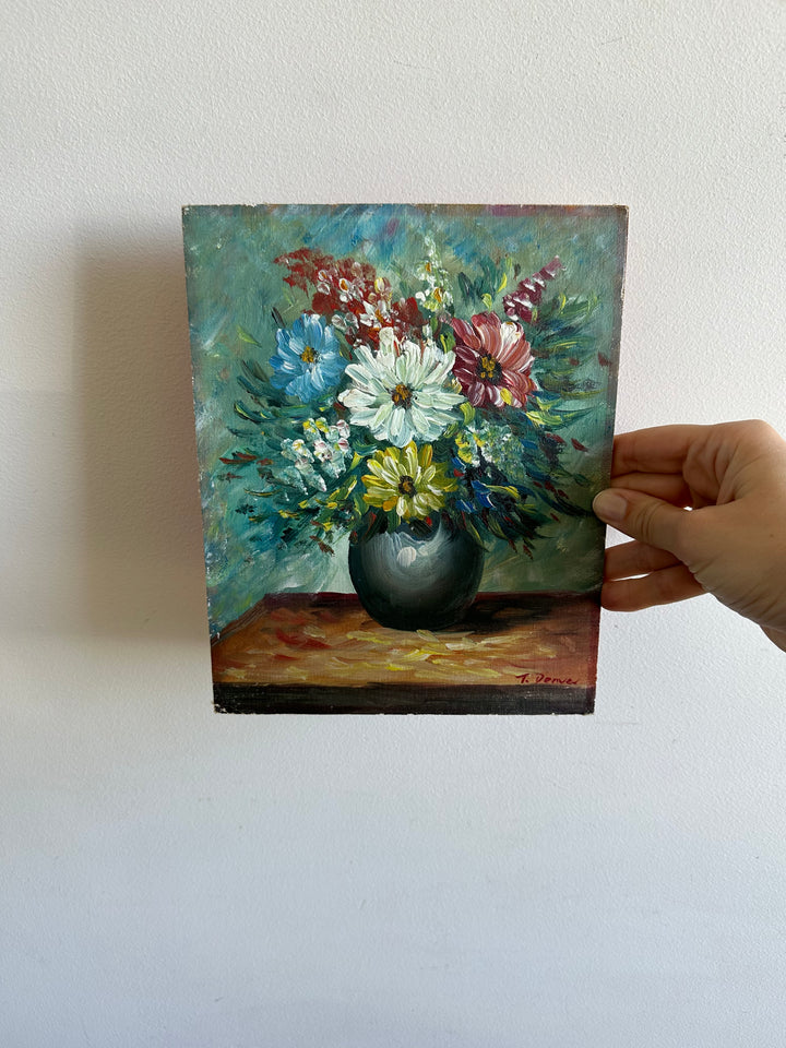 Peinture bouquet de fleurs sur toile avec fond bleu