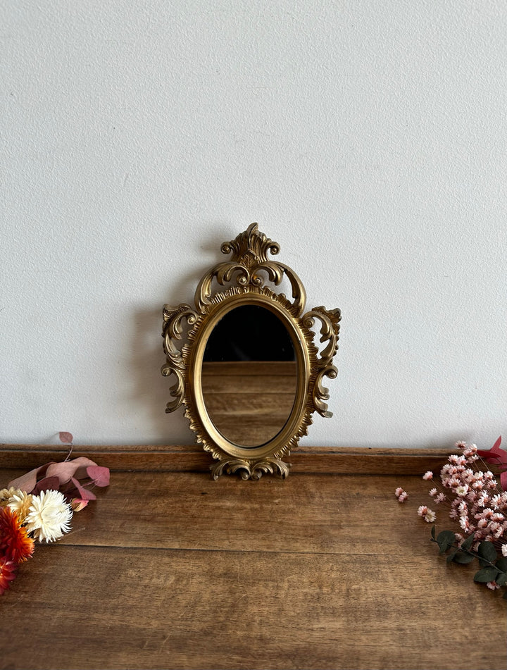 Miroir style rococo en plastique doré